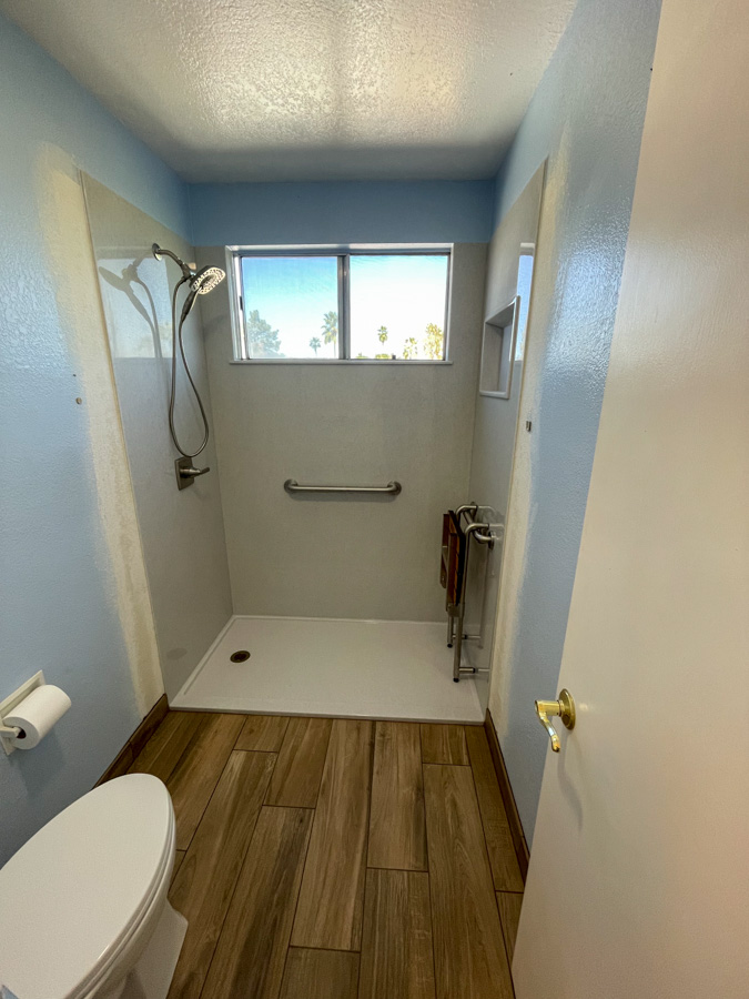 Walk-in tiled shower in a remodeled bathroom by Orange Cactus Remodeling, serving Mesa, AZ