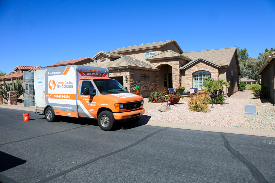 Orange Cactus Remodeling truck outside a single-family home during a whole-home remodel, serving Mesa, AZ