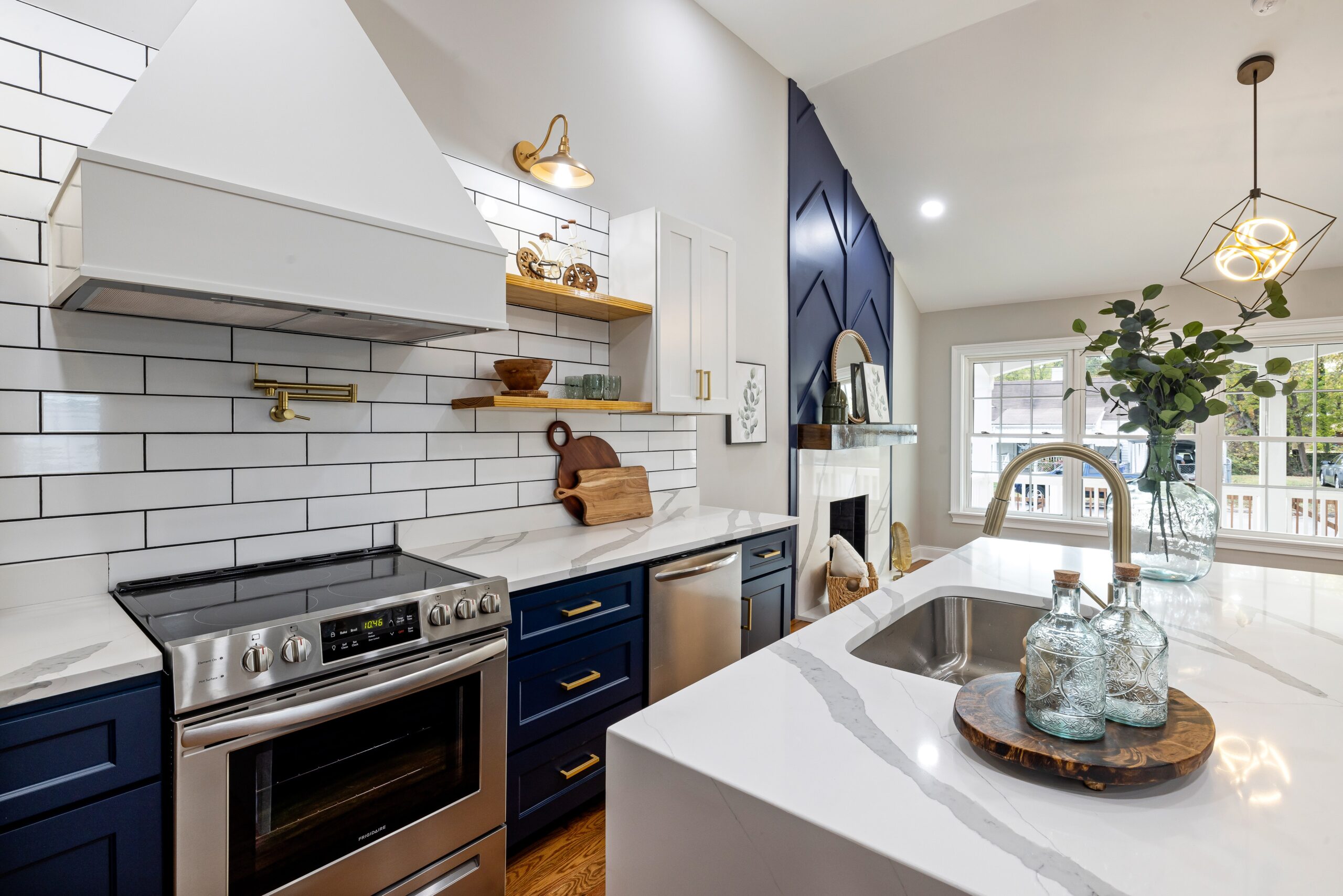 kitchen remodel with quartz countertop installation, cabinet refacing and backsplash installation.